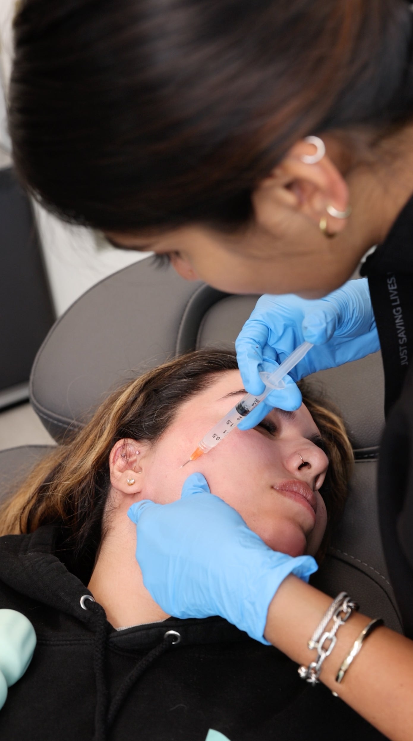 provider injecting sculptra