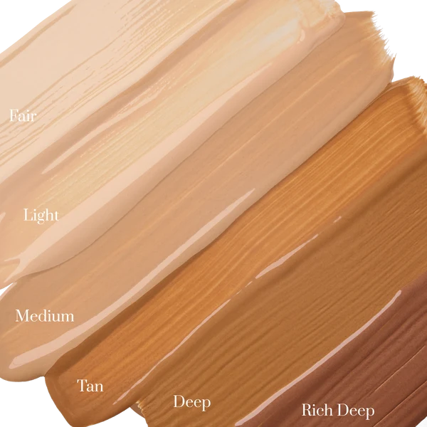 Four diagonal swatches of liquid foundation or makeup shade labeled Fair, Light, Medium, Tan, Deep, and Rich Deep on a white background.