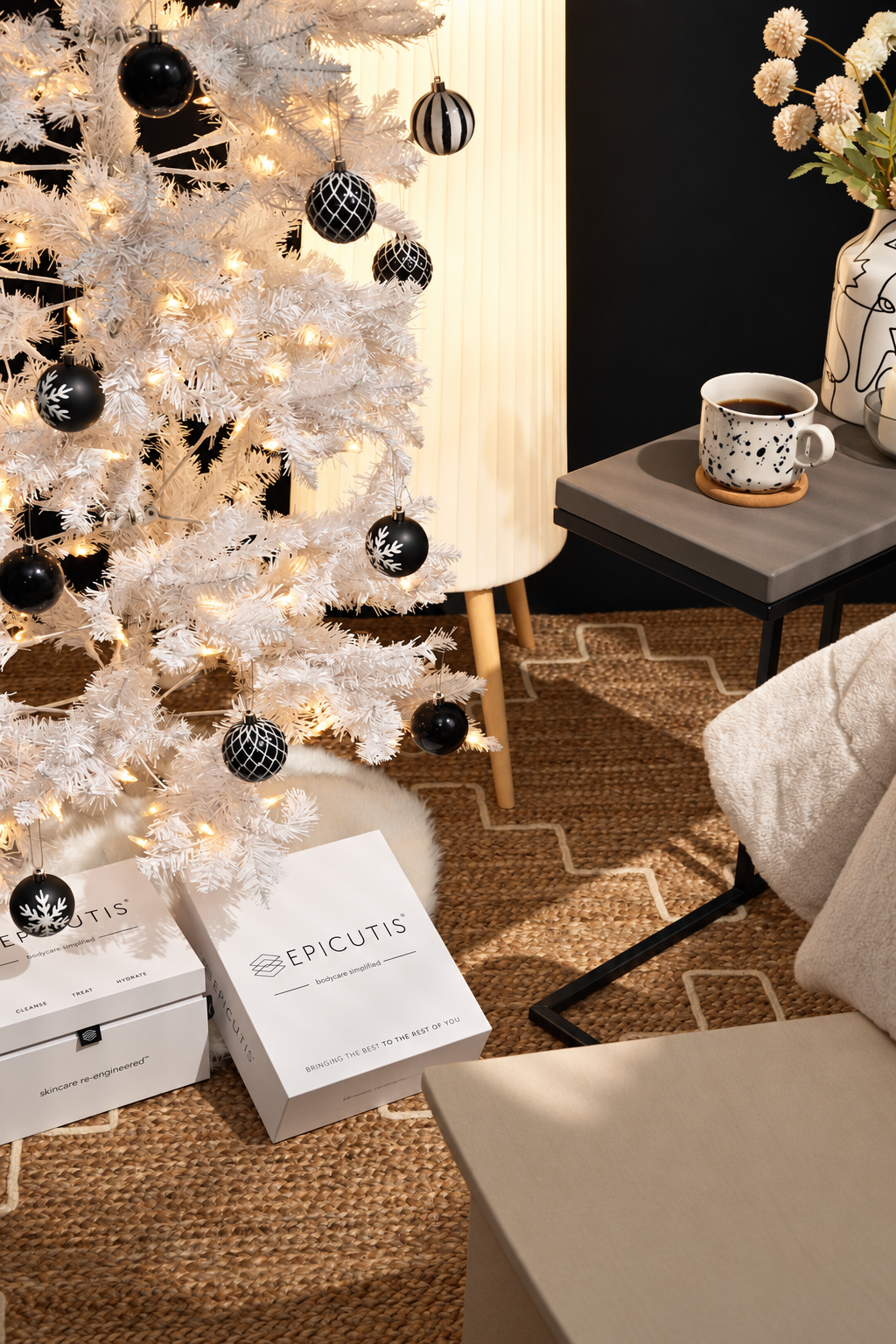 Epicutis holiday boxes under a white Christmas tree