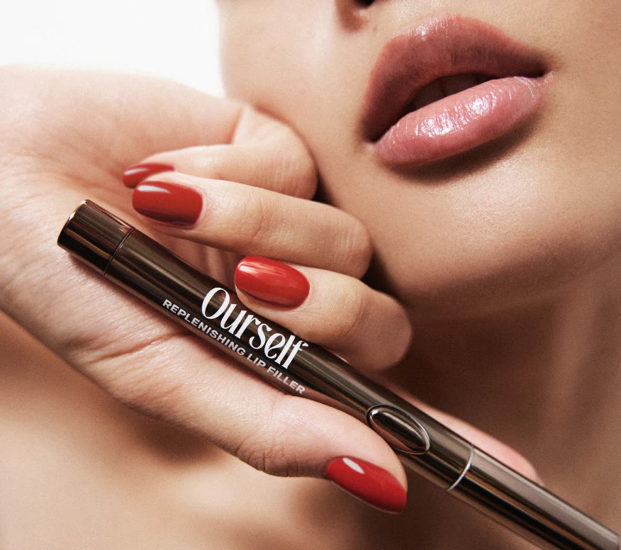 Model Holding Ourself Lip Plumping and Enhancing Regimen 