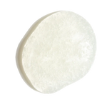 A single irregularly shaped, translucent off-white drop of Ourself Daily Purifying Cleanser