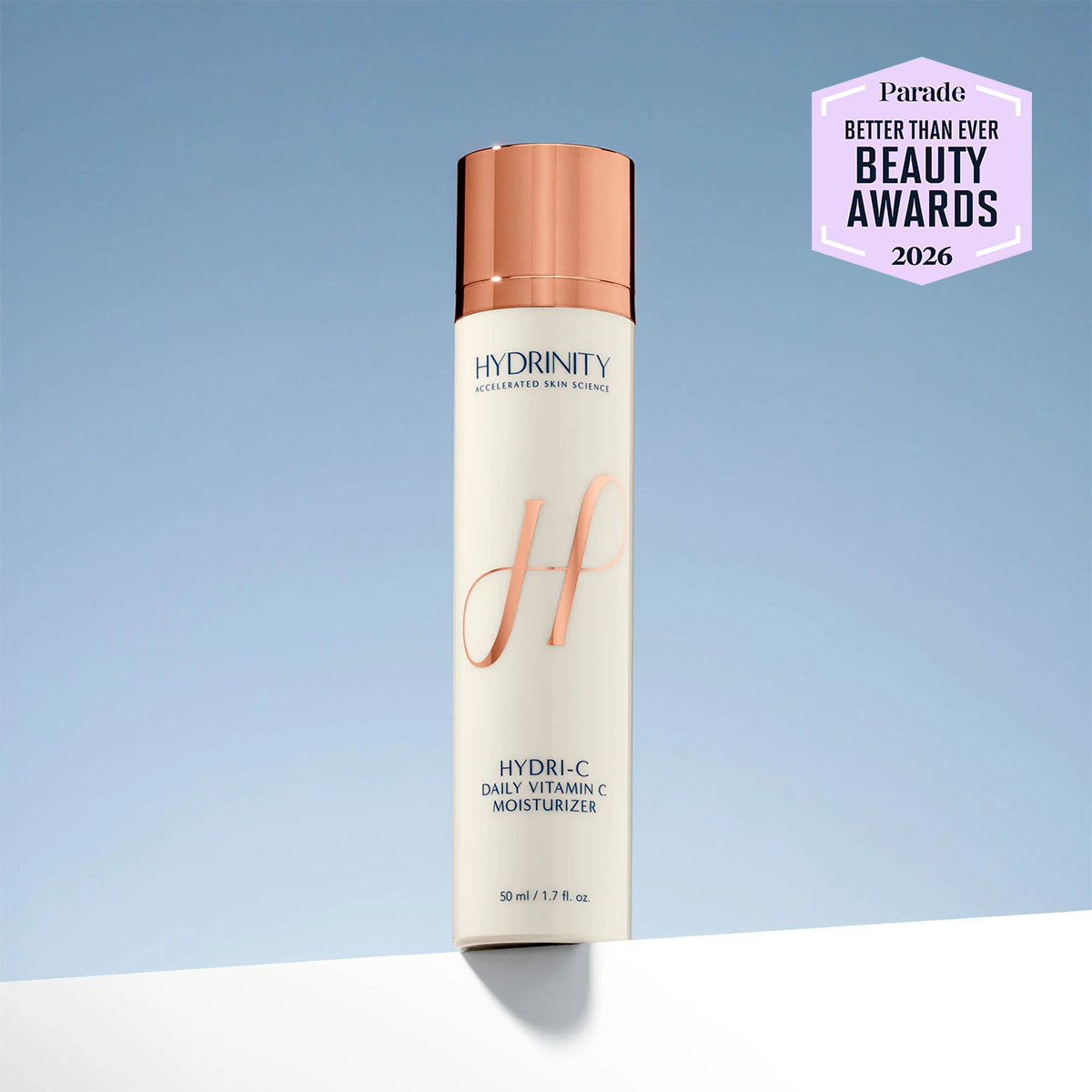 Hydrinity HYDRI-C Daily Vitamin C Moisturizer, bottle on blue background with award seals