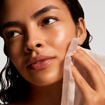 iS Clinical Active Peel System, model using a towelette